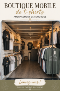 Une boutique mobile de t-shirts exposée lors d'un festival, avec divers designs créatifs.